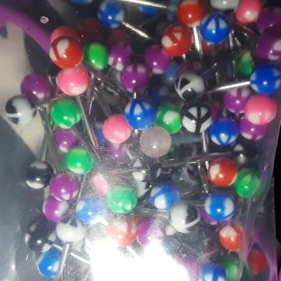 Peace sign tongue ring - Picture 2 of 2